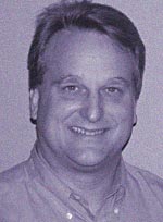 Thomas K. Holcomb, Ph.D.